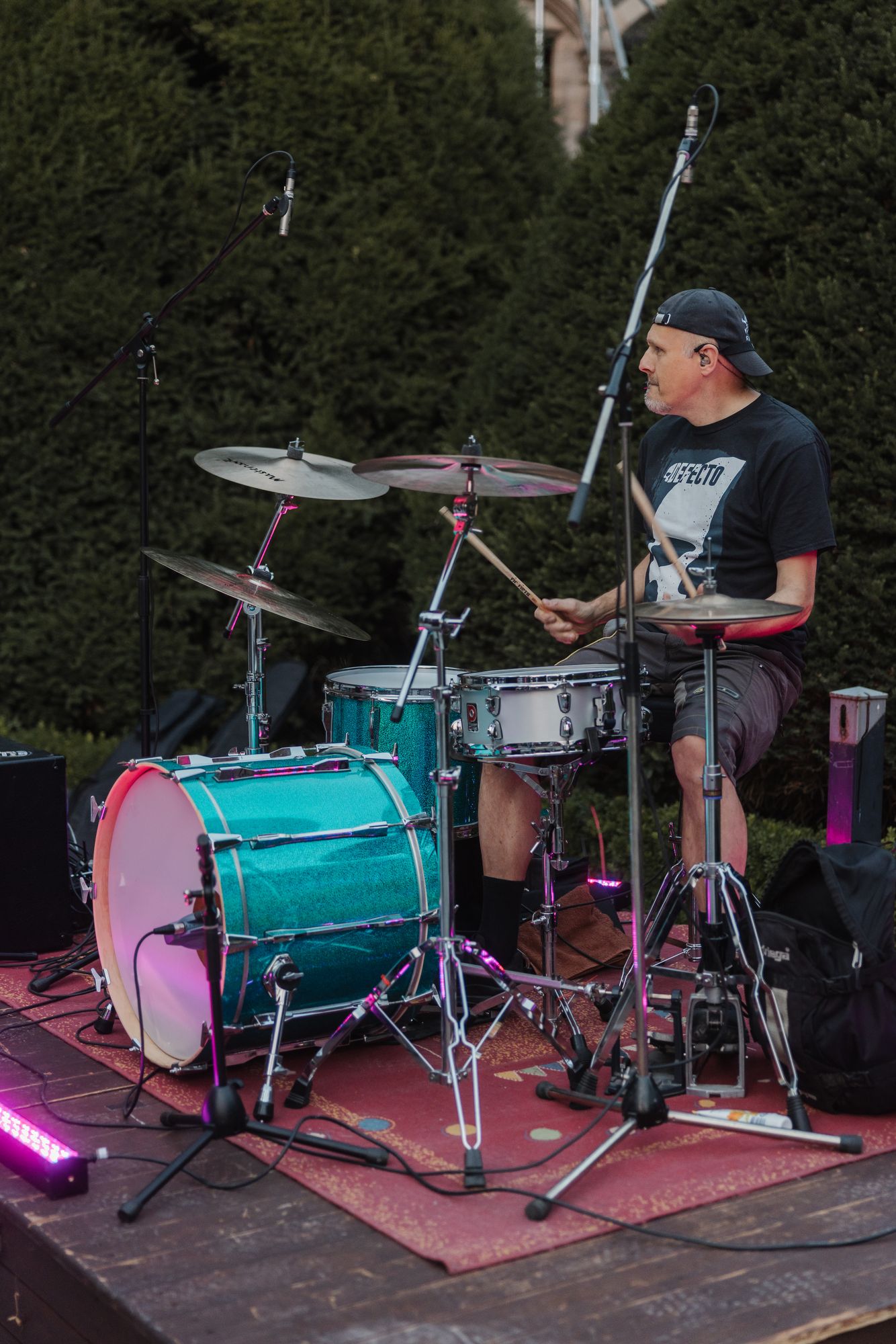 Drummer of the band on stage in the castle courtyard